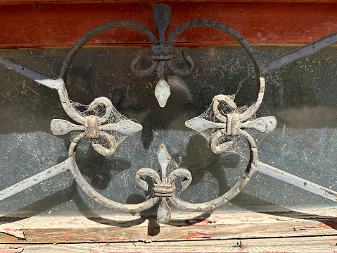 Ornament made of wrought iron on a window