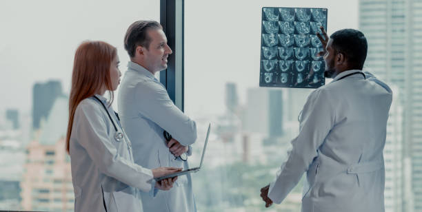 istock Doctors analyze MRI during breaks to plan treatment, procedures, and refer patients to specialists. 1580779113