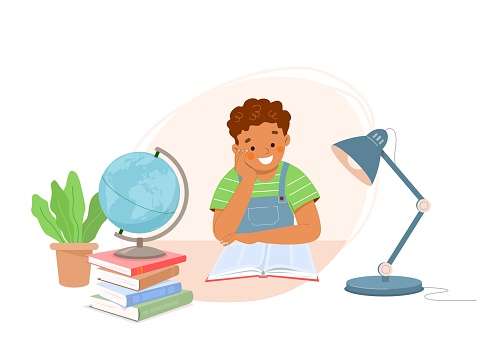 Little black boy sits at desk and reads book. On table are stack of books, globe, lamp. Lesson at school, study at home. Concept of children's education, literacy, diligence, learning. Vector.