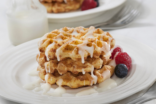 Crispy Cinnamon Roll Waffles with Icing. Made with Store Bought Dough.