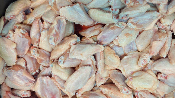 istock Fresh chicken joints in a tray ready for sale 1580785969