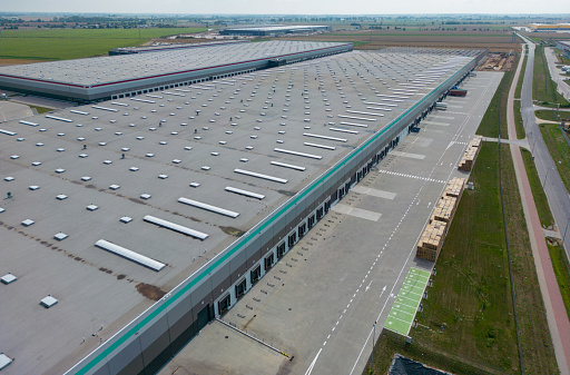 aerial drone view of  warehouse building with docks