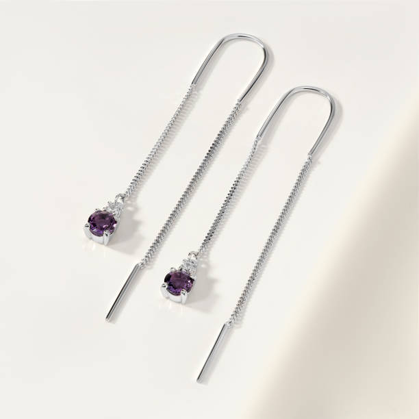 Elegant jewelry set. Jewellery set with gemstones. Jewelry accessories collage. Product still life concept. Ring, necklace and earrings. stock photo