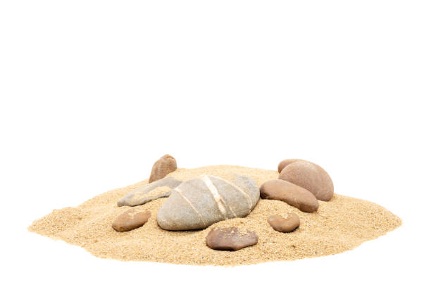 istock Rocks in sand pile isolated on white background and texture 1580805366