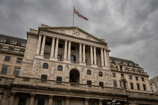 London, UK: The Bank of England on Threadneedle Street in the City of London with union jack.