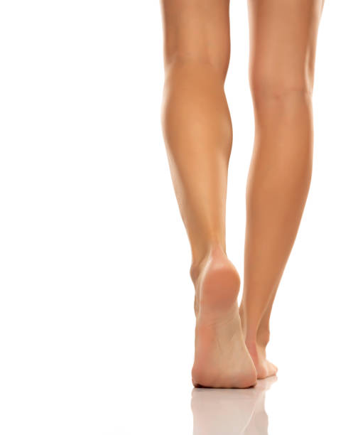 istock Beautiful fresh bare feet and heels 1580817953