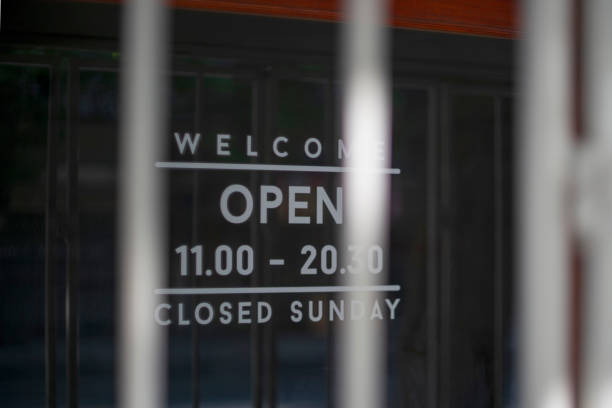 istock open sign hanging outside a restaurant, store, office or other 1580852223