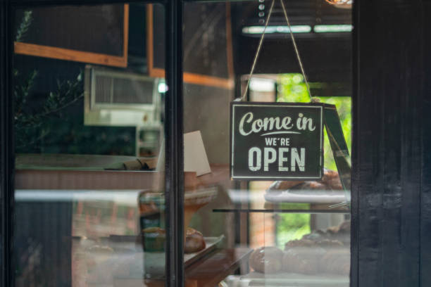 istock open sign hanging outside a restaurant, store, office or other 1580852233