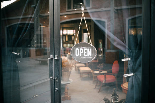 istock open sign hanging outside a restaurant, store, office or other 1580852823