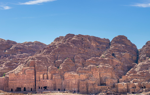 The Monastery, Petra, Jordan: The Monastery, also known as Ad Deir and also spelled ad-Dayr and el-Deir, is a monumental building carved out of sandstone in the ancient Jordanian city of Petra. The Monastery was probably carved in the mid-first century AD.