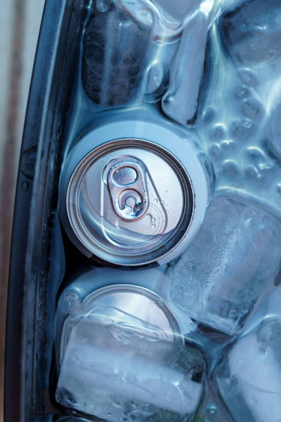 istock Refreshing drink with ice cubes in a can, perfect for hot days. 1580934382