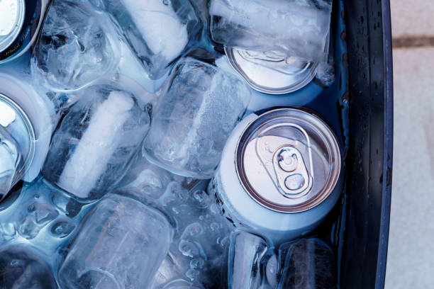 istock Refreshing drink with ice cubes in a can, perfect for hot days. 1580934384