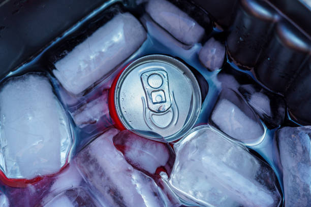 istock Refreshing drink with ice cubes in a can, perfect for hot days. 1580934919