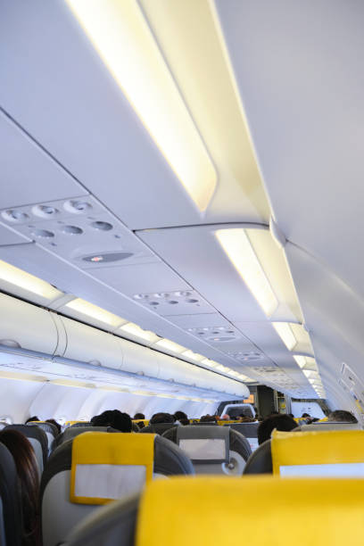 istock aircraft interior seen from the back seat 1580955104
