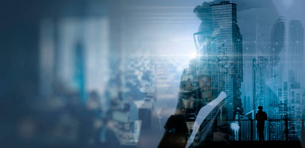 istock Digital technology, internet network connection, digital marketing IoT internet of things. Business woman using mobile phone and laptop computer connecting the internet 1580964349