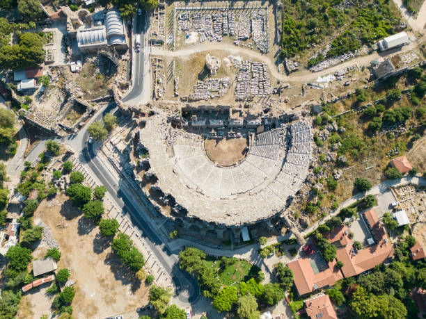 Aerial view of Side Ancient City in Antalya, Turkey. Side is an ancient Greek city on the southern Mediterranean coast of Turkey in Antalya, a resort town and one of the best-known classical sites in the country. temple of apollo antalya province stock pictures, royalty-free photos & images