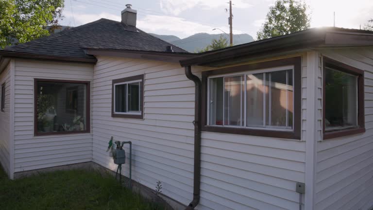 Scenic view of modest older home, in leafy community