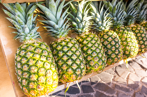 Fresh pineapple fruit for sale at a street market