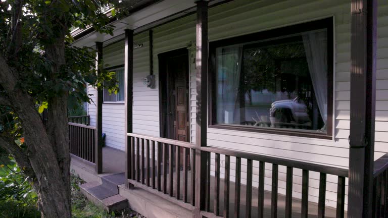 Scenic view of modest older home, in leafy community