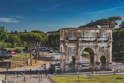 A striking image of the Arch of Constantine, the largest triumphal arch in Rome. Erected to commemorate Emperor Constantine’s victory at the Battle of Milvian Bridge, this monument stands as a testament to the grandeur of Roman imperial celebrations and the city’s rich historical tapestry.