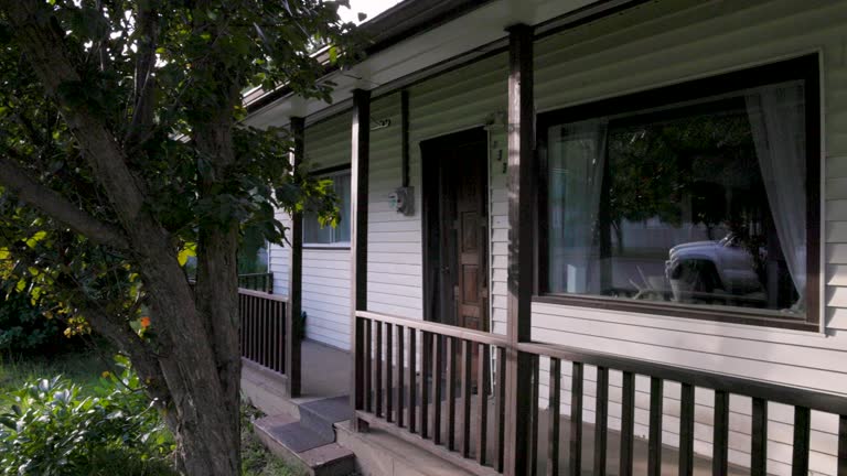 Scenic view of modest older home, in leafy community