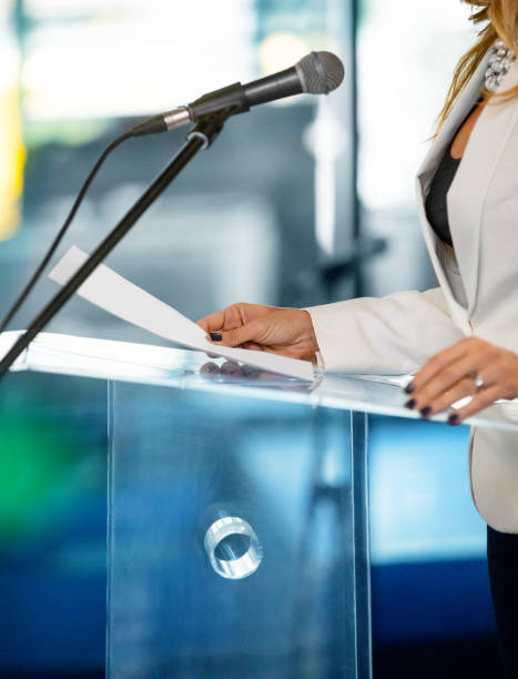 Businesswoman at the lectern stock photo