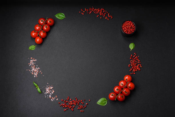 istock Ingredients for cooking cherry tomatoes, salt, spices and herbs 1581178816