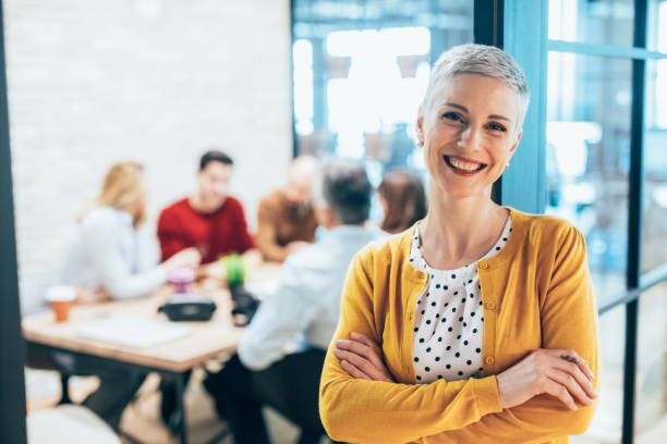 istock Confident businesswoman in modern office 1581178826