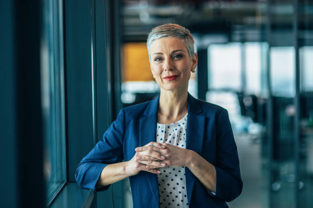 istock Confident businesswoman in modern office 1581178827