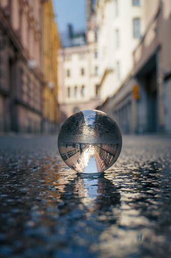 Close up of a crystal ball on city street