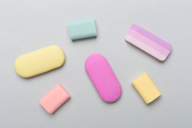 istock Colorful eraser on color backgroung, top view 1581240121