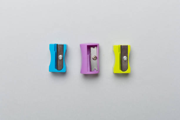 istock Different sharpeners on color backgroung, top view 1581240195