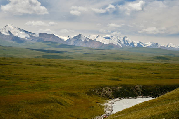 istock Viewpoint of snowcapped mountain ridges 1581240743