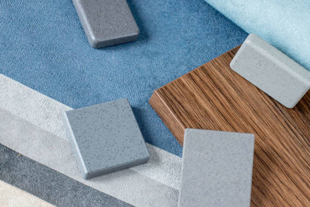 istock Samples of finishing materials, close-up view, including various wooden laminates, interior wallpaper, gray artificial stone 1581269699