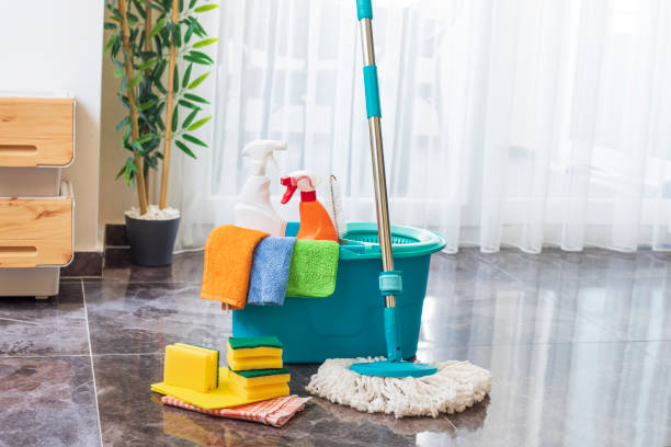 istock Plastic bucket with cleaning supplies at home 1581329139