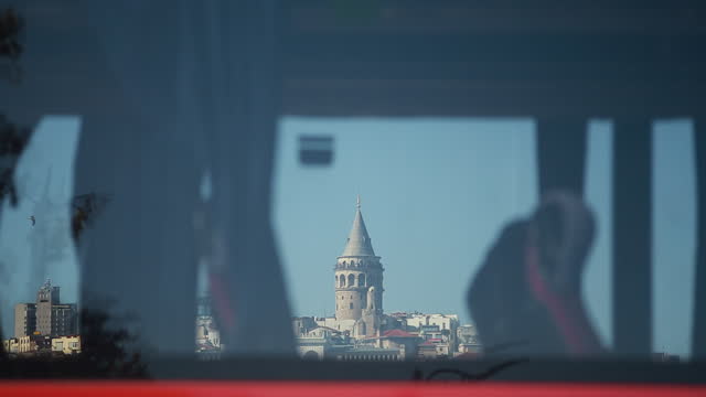 Galata district and traffic scene from Eminonu Square in Istanbul from a bus window