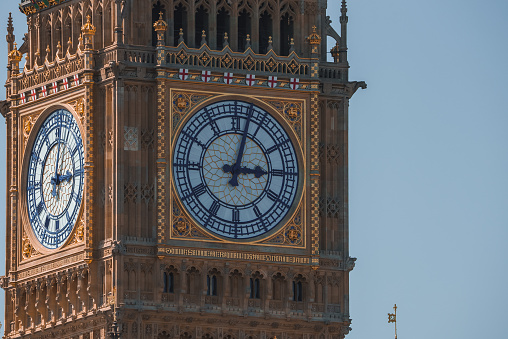 Close-up on the newly refurbished clock tower of the Palace of Westminster. World famous Cultural Icon of the UK.