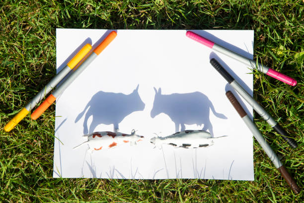 Contrasting shadow from the toy figures of cow