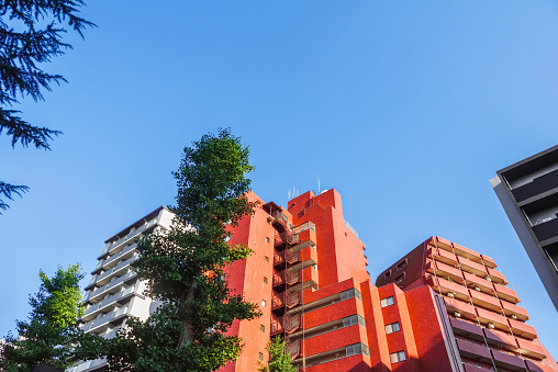 Group of housing complexes, blue sky background. Tokyo Japan.