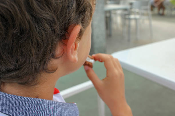 istock a boy eating an ice cream 1581561750