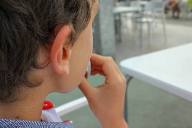 istock boy having an ice cream in a restaurant 1581561753