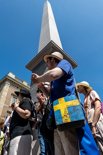 Stockholm, Sweden June 24, 2023 Onlookers at a  reenactment parade  to commemorate 500 years since King Gustav Wasa took Stockholm in 1523 to create the nation of Sweden, at Slottsbacken at the Royal Palace.