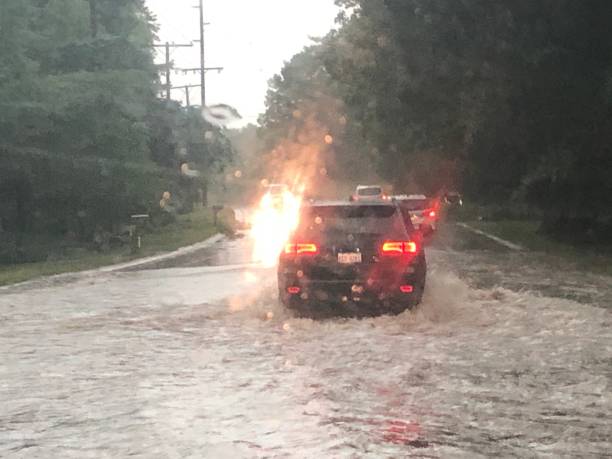 istock Flooding at a Michigan road. 1581619851