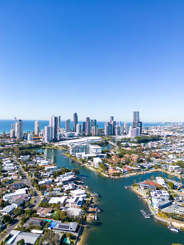 Aerial view of waterfront homes and hi-rise buildings at Broadbeach, Gold Coast, Australia