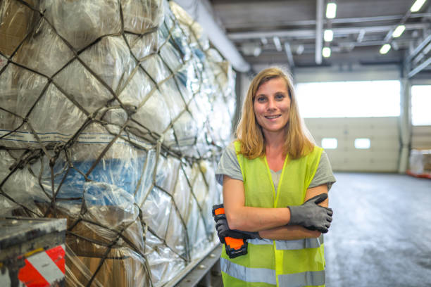 istock Caucasian Female Airport Warehouse Worker 1581632899