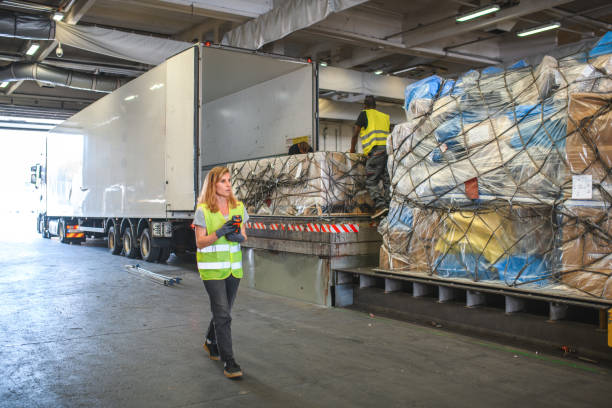 istock Female Airport Warehouse Crane Operator 1581633407