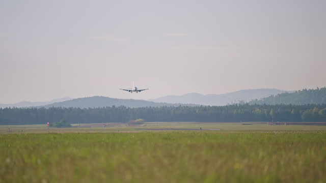 Commercial Airplane Landing At The Airport
