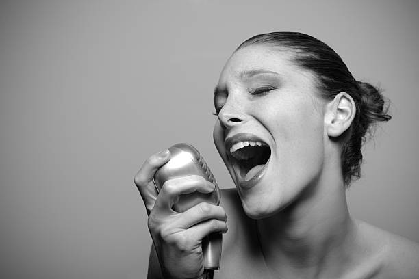istock Performance of a beautiful woman singer 158165756