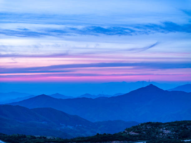 Beautiful sunrise and wind power in the mountains