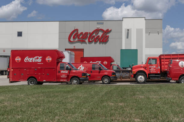 Coca-Cola plant. Coca-Cola manufactures Coke, Diet Coke, Sprite, Dasani, and various Coke coffee products. Whitestown - July 30, 2023: Coca-Cola plant. Coca-Cola manufactures Coke, Diet Coke, Sprite, Dasani, and various Coke coffee products. coca cola stock pictures, royalty-free photos & images